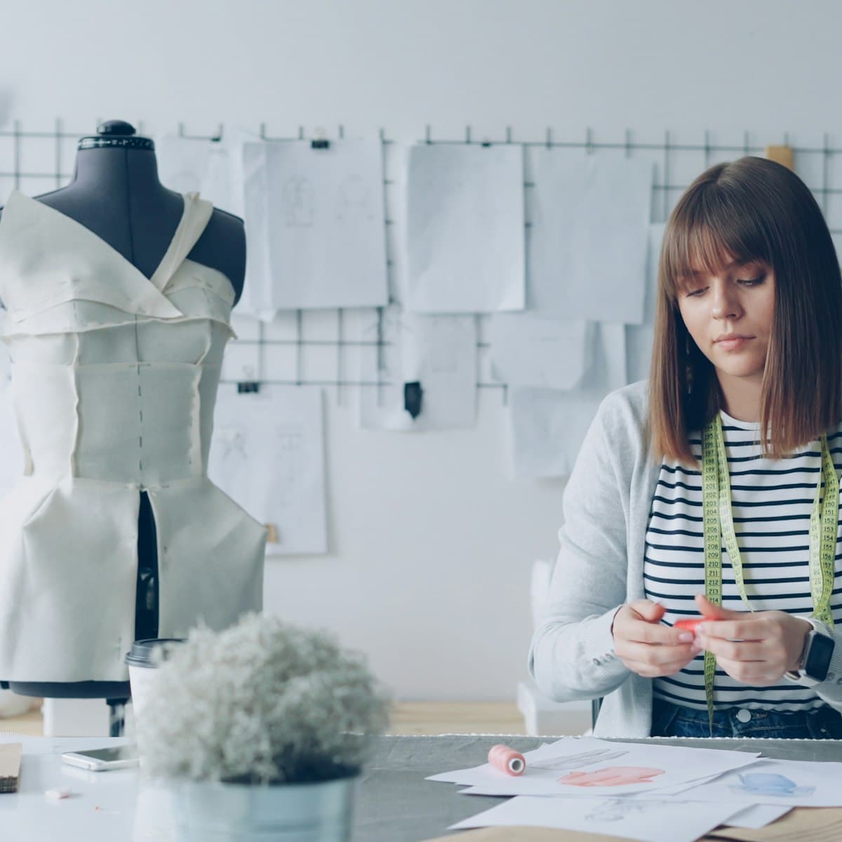 MakeUrMark founder designing in her studio